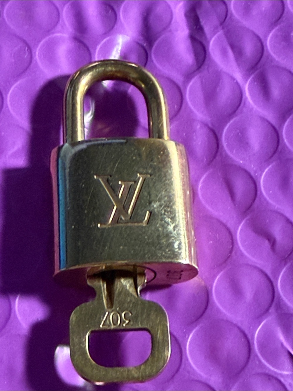 Louis Vuitton Gold Padlock with Key